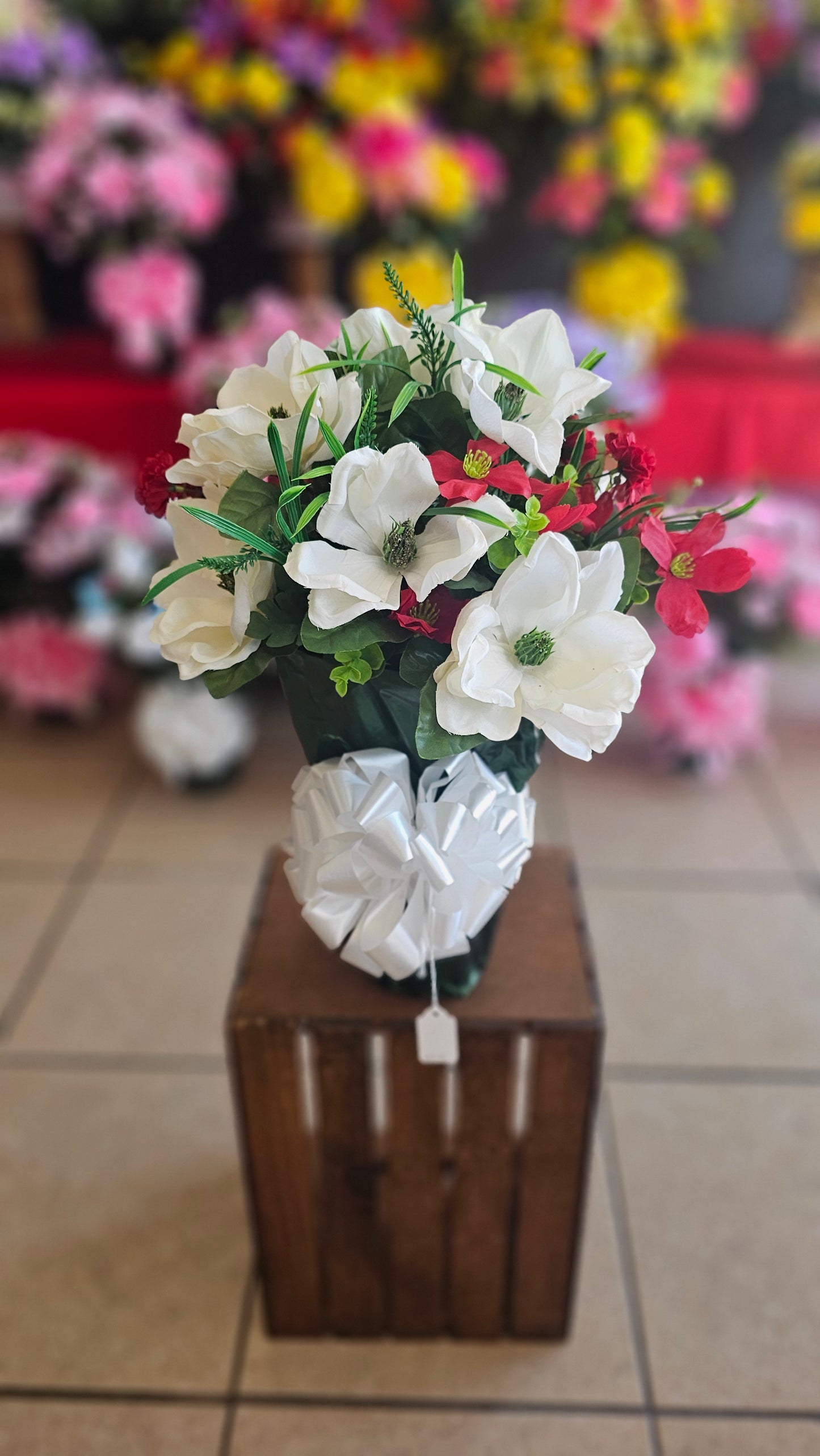 “Still Waters” in White Arrangement with Red Accents